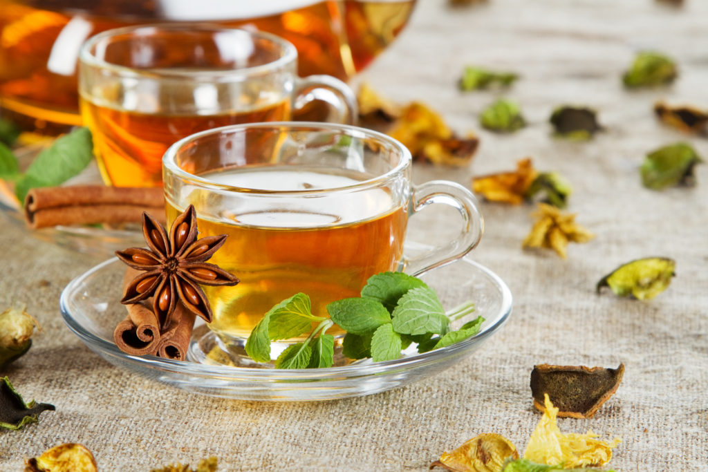 Tea cup with fresh mint leaves